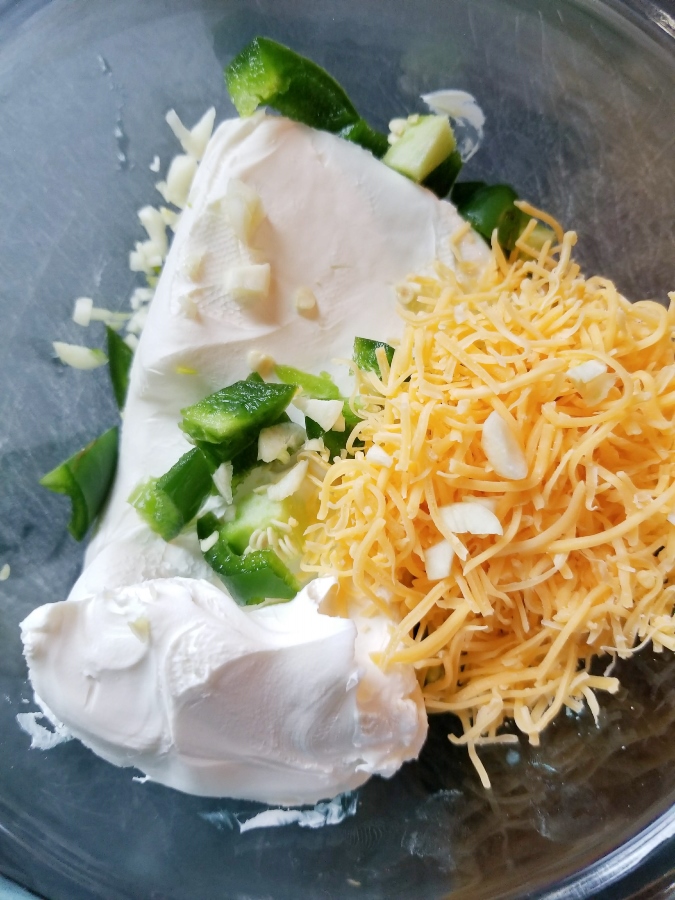 cream cheese with jalapenos, garlic, and shredded cheese