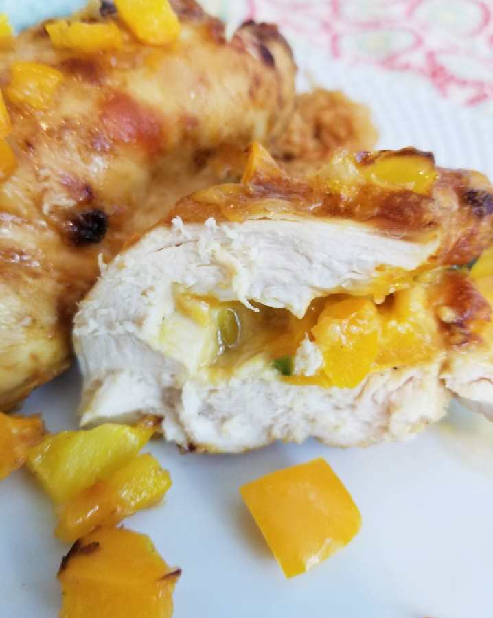 Air Fryer Fajita Stuffed & Smothered Chicken cut in half 