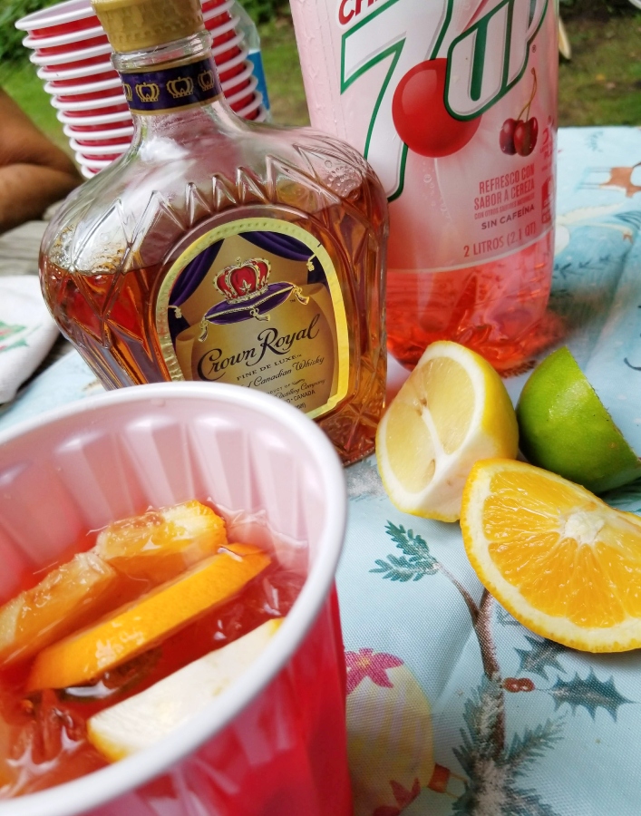 Sunshine Drink with lemon, orange, lime, whiskey, and Diet Cherry 7 Up
