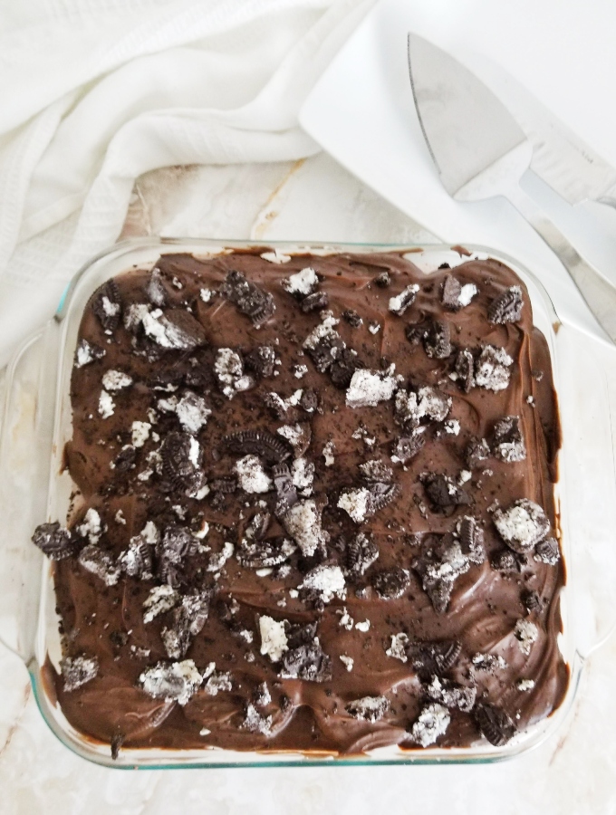 No Bake Oreo Layer Cake from above with cake cutter