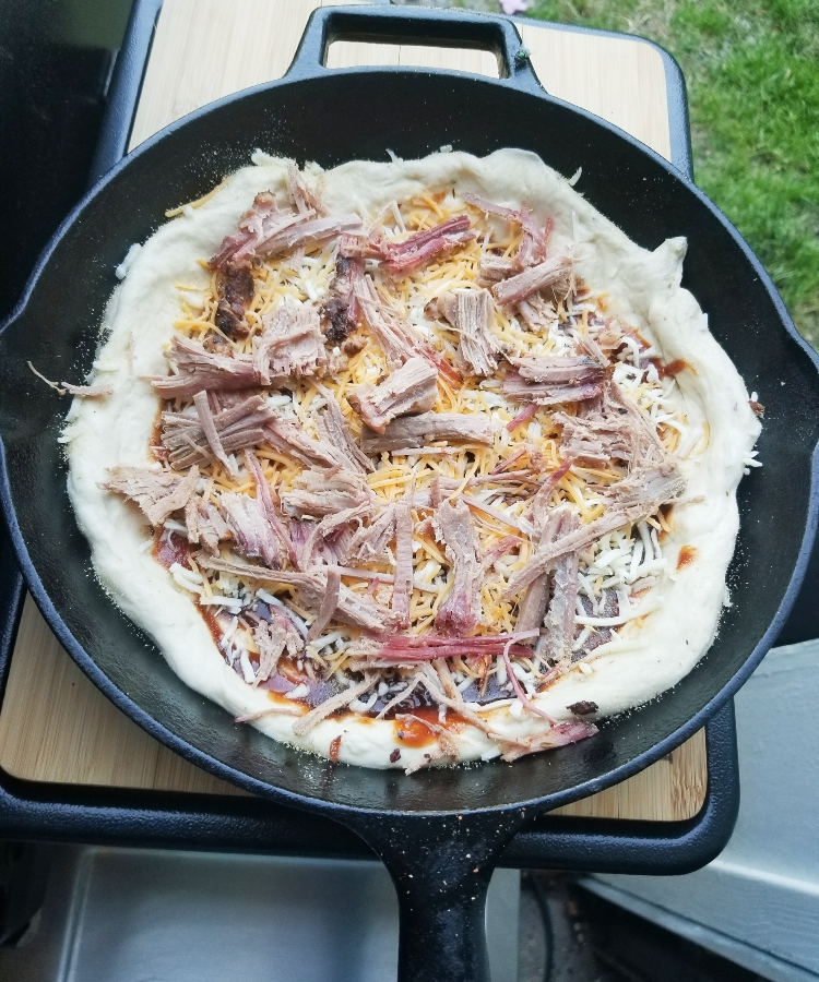 BBQ Smoked Brisket Pizza in cast iron pan 