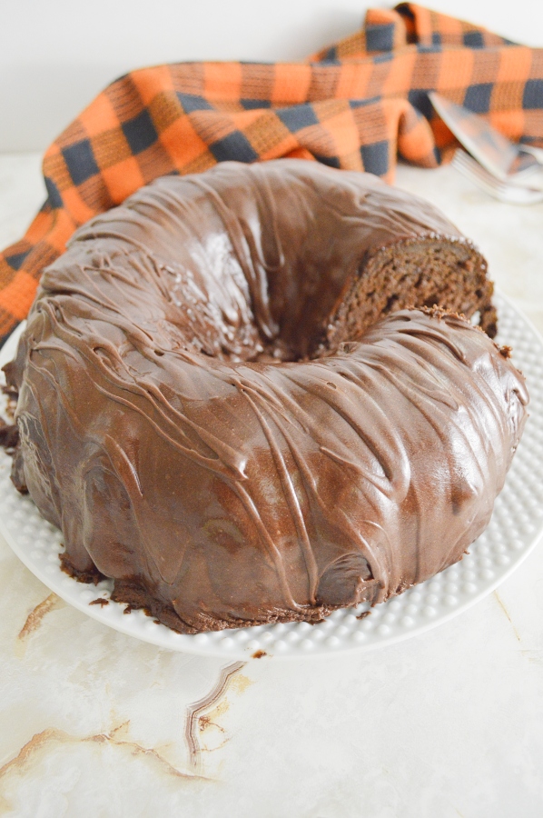 Chocolate Pumpkin Bundt Cake whole cake with slice removed