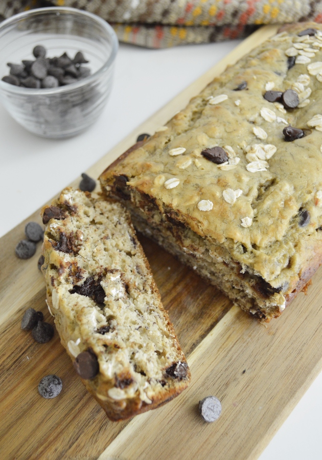 Oatmeal Chocolate Chip Banana Bread with slice and chocolate chips 