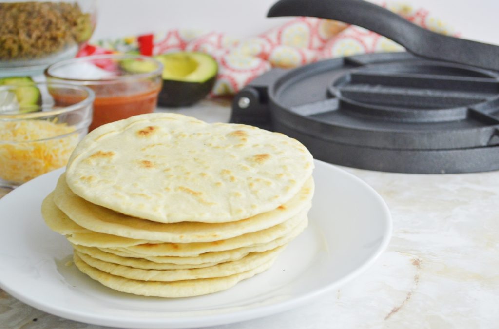 Stacked tortillas on plate