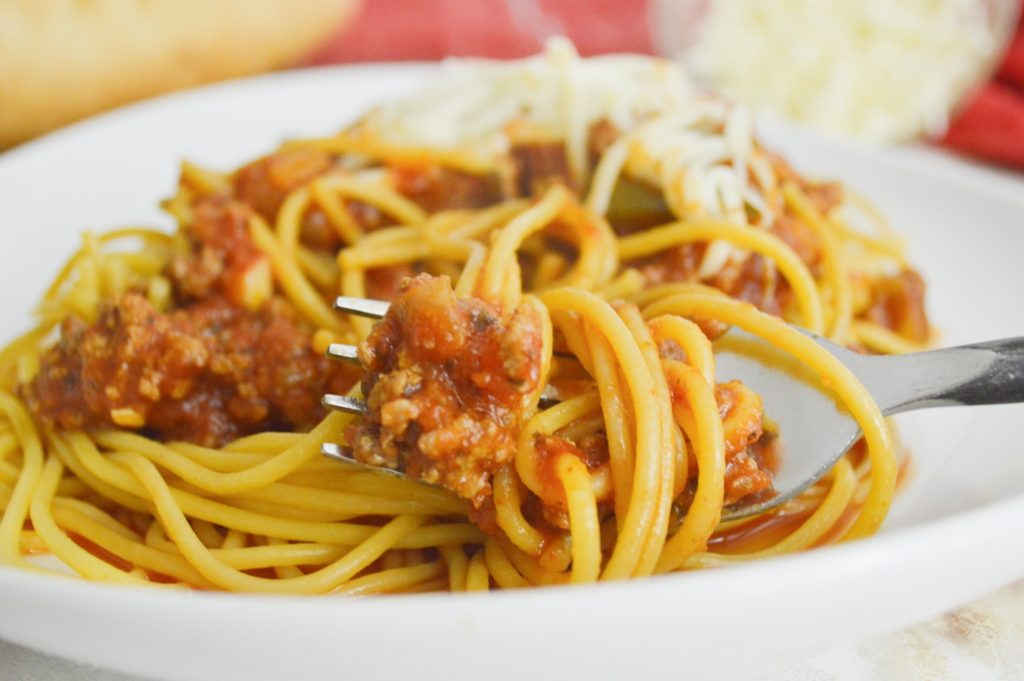 close up of spaghetti on fork 