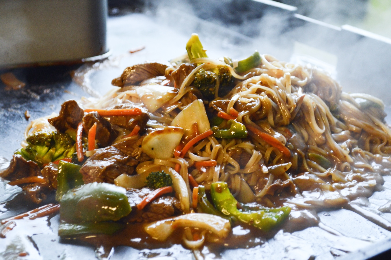 Blackstone Steak & Vegetable Noodle Stir Fry on griddle feature image 