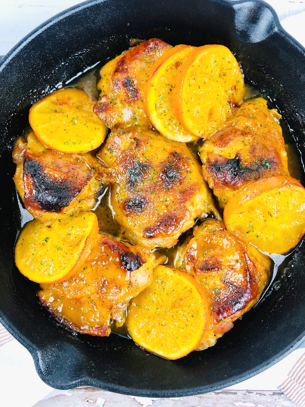 how to make honey orange chicken thighs in cast iron skillet