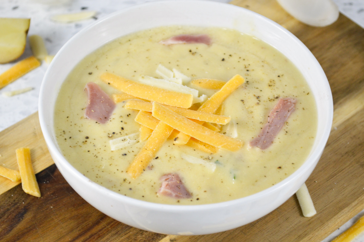 Cream of potato soup with ham and cheese 