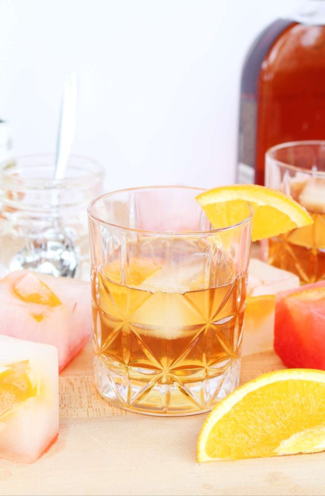 Old Fashioned Cocktail with infused Ice Cubes 