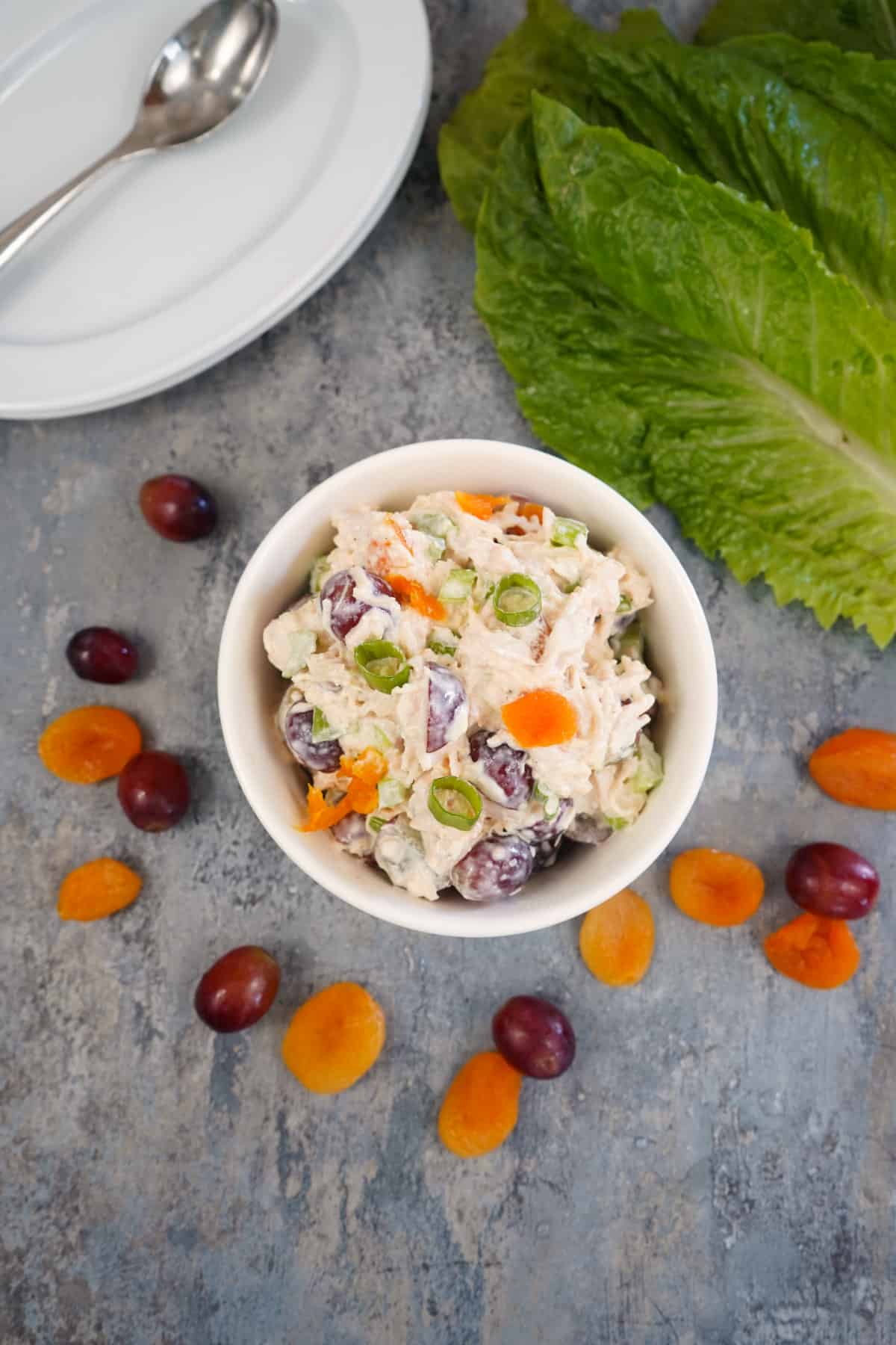 chicken salad with grapes and apricots in bowl