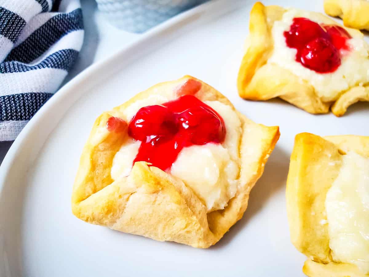 Cherry pastries on white plate