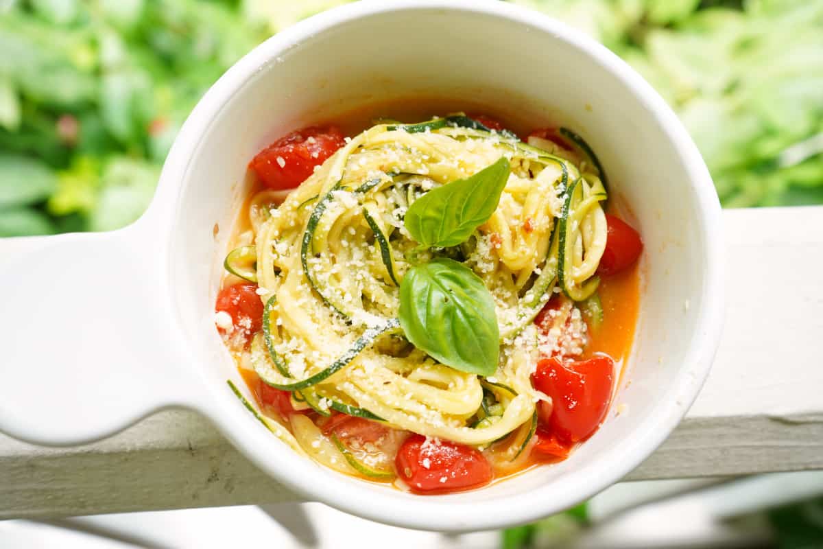 Zucchini noodles in white bowl