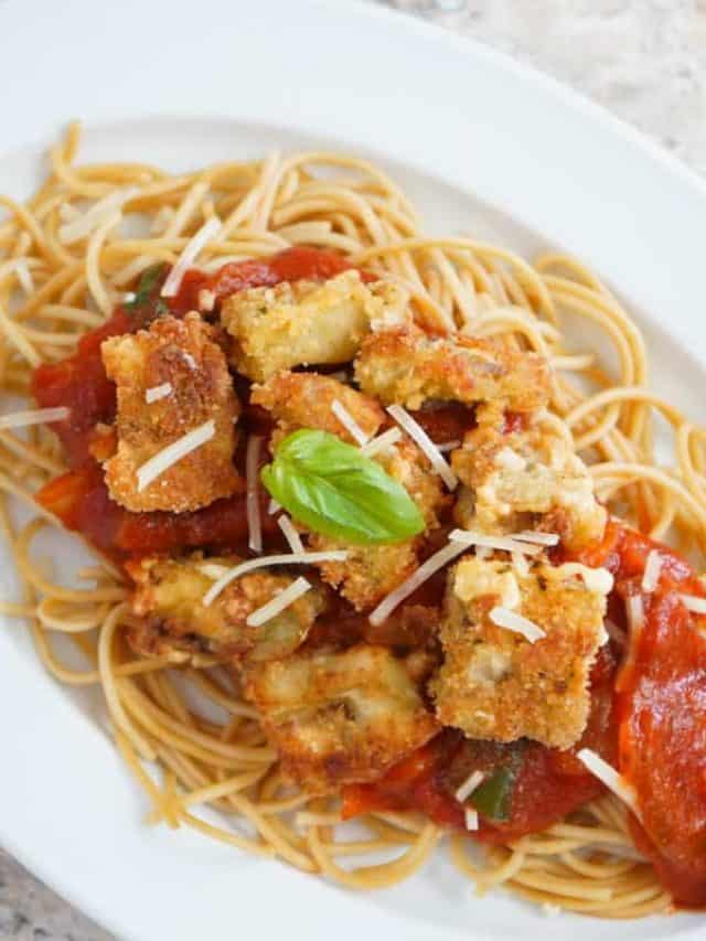 fried eggplant over pasta