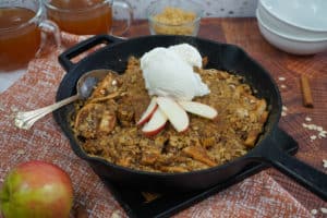 Easy Smoked Apple Crisp in cast iron skillet.