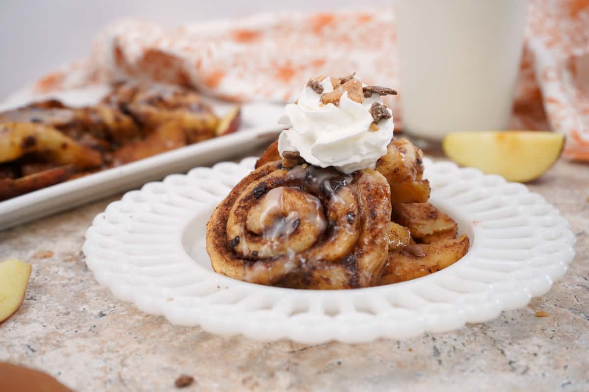 Slow cooker apple cinnamon rolls with whipped cream