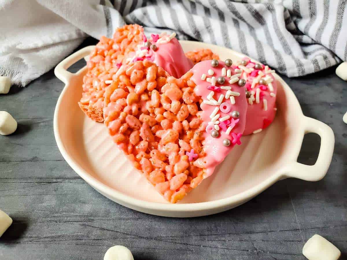 Heart Shaped Rice Krispies Treats on white plate. 