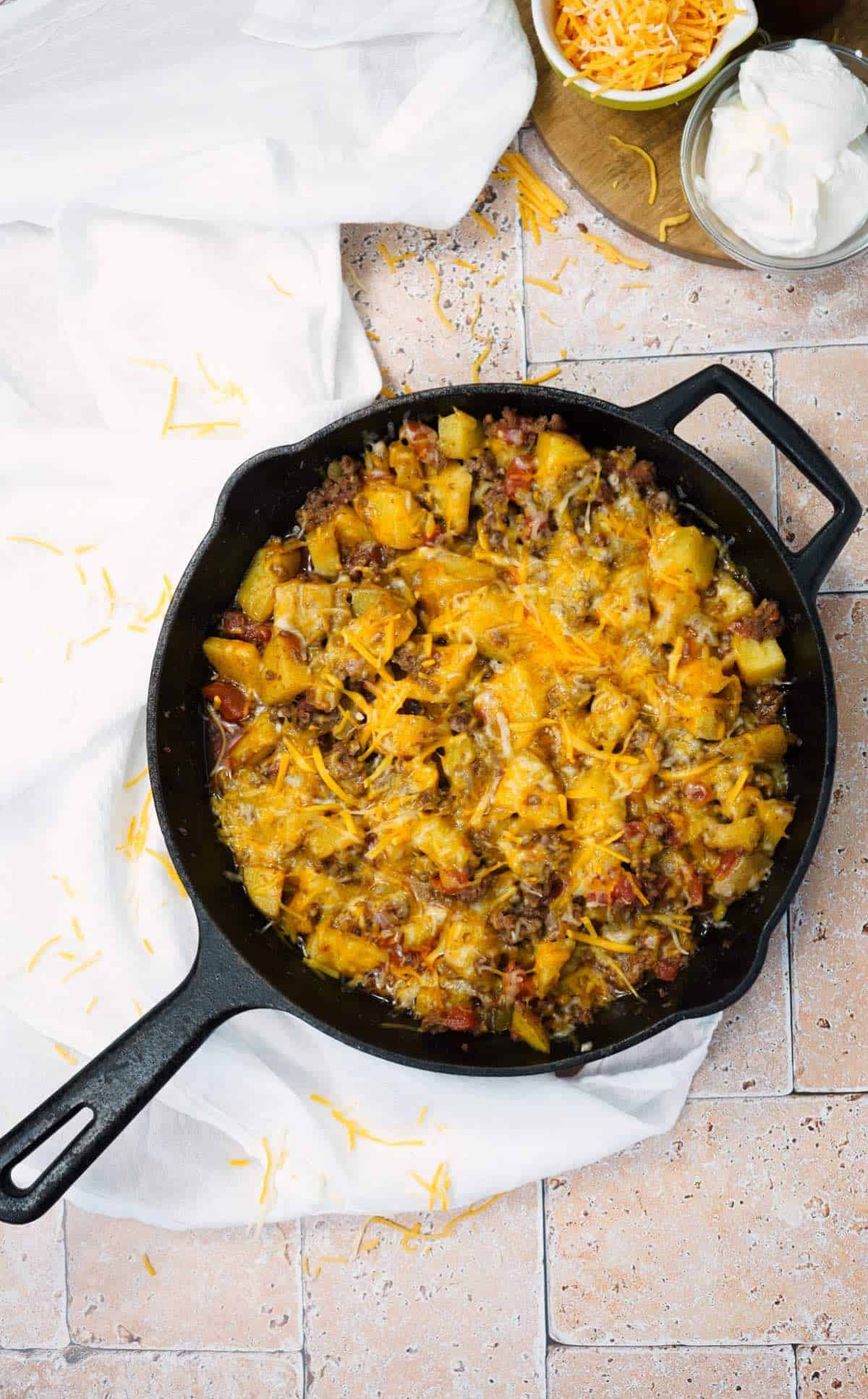 Potatoes with taco meat in skillet 