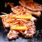 Blackstone Pork Chops with peppers and onions