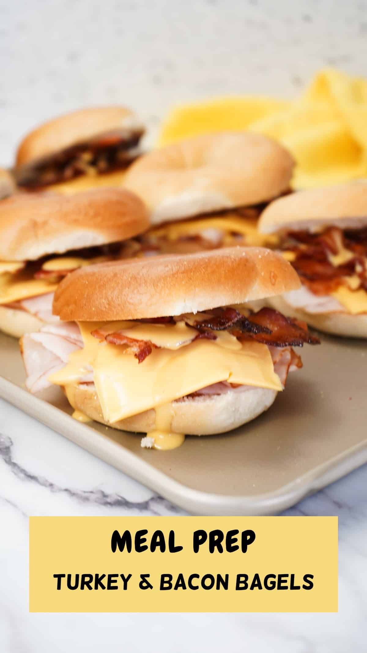 Meal prep bacon and turkey bagels with text