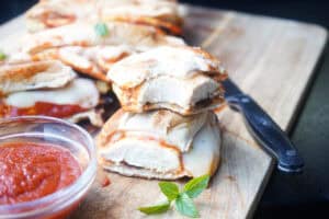 Chicken parmesan sandwich cut in half.