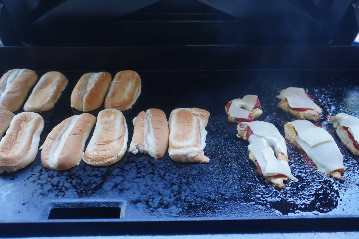 assembling chicken parm sandwich