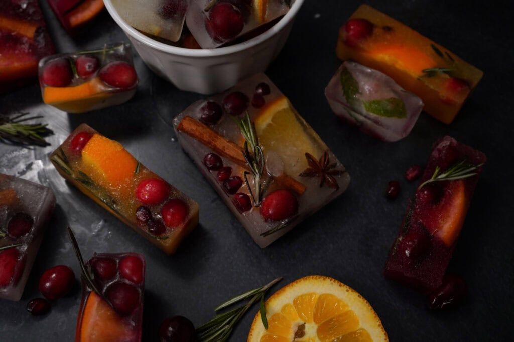 Infused Ice Cubes on background