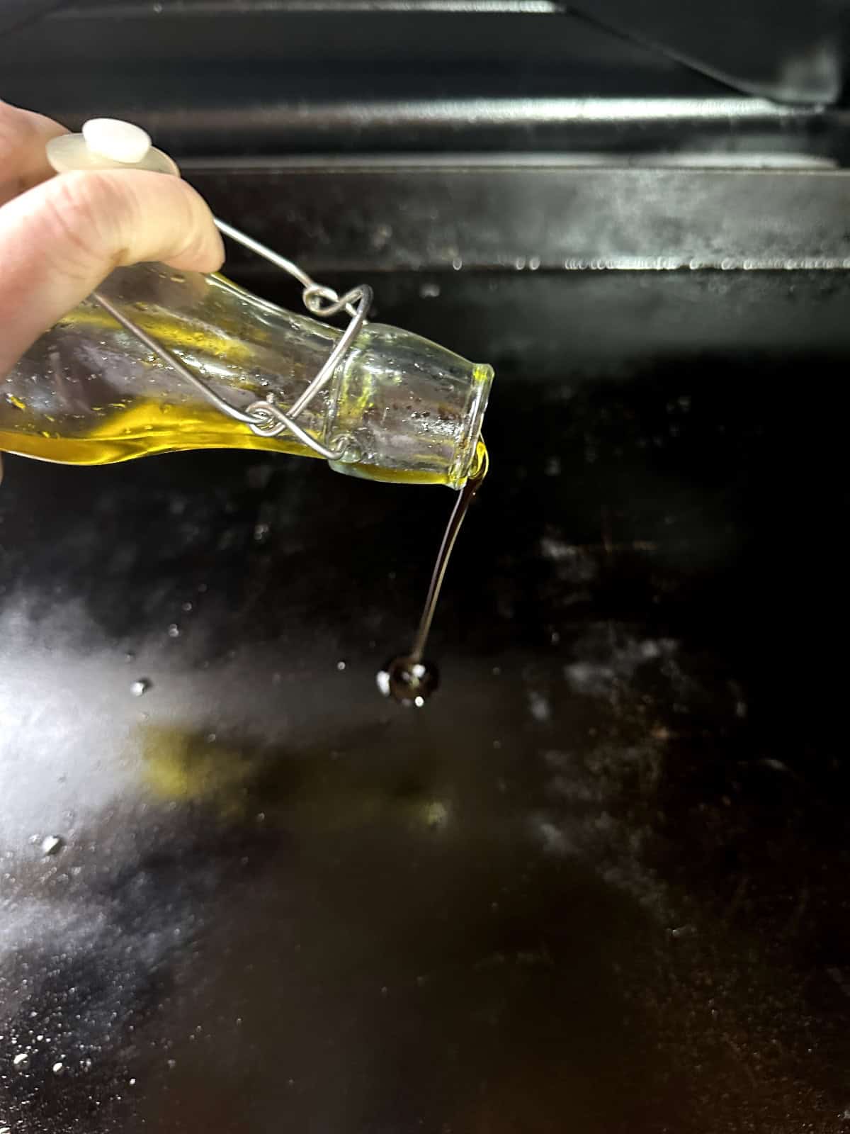 adding oil to flat top