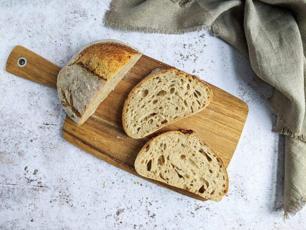 Bread sliced on cutting board