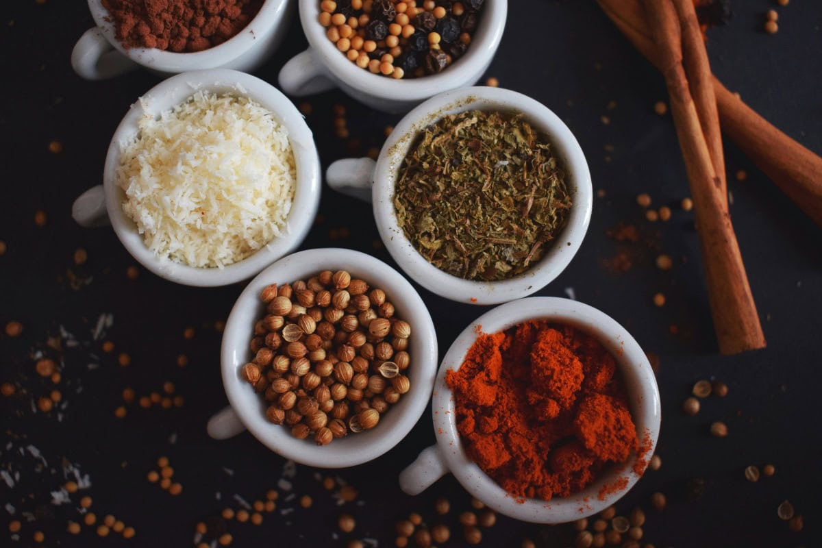 seasonings in small white bowls