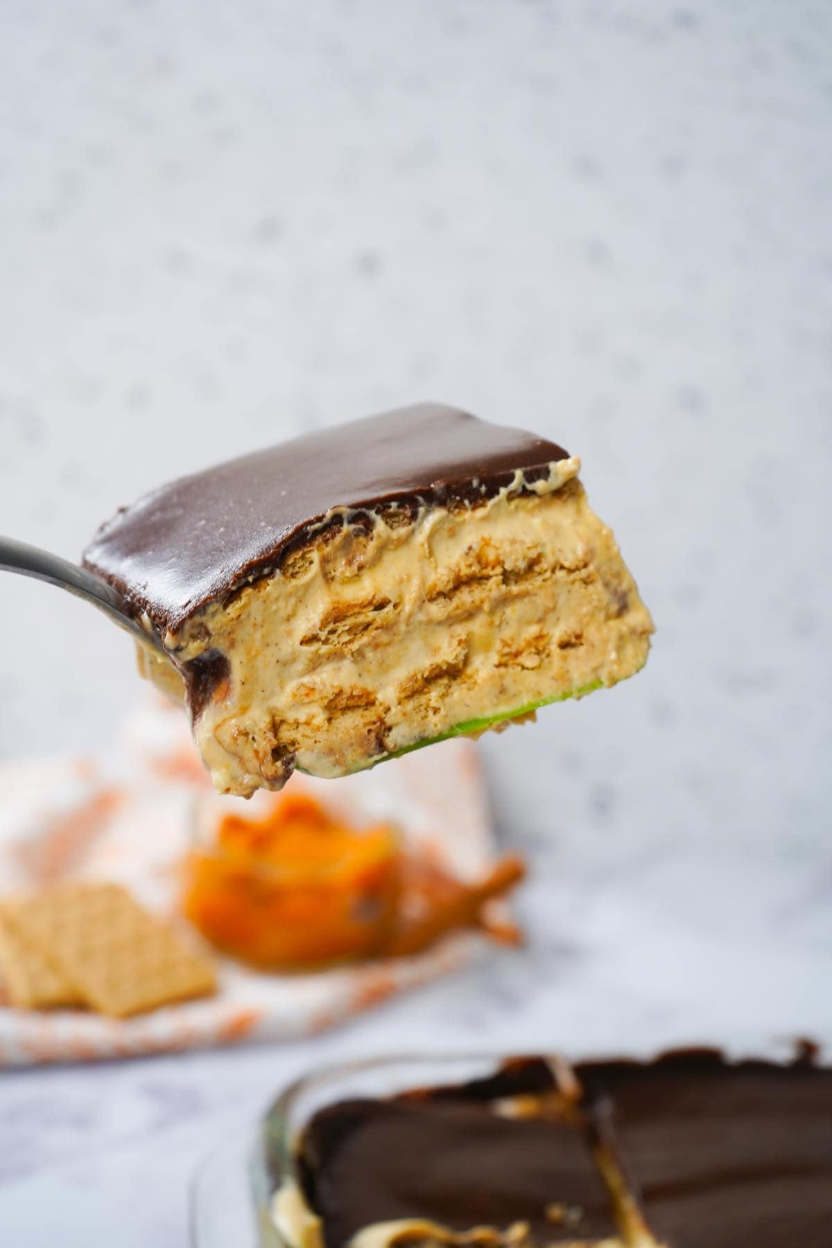 Pumpkin Eclair cake on spatula