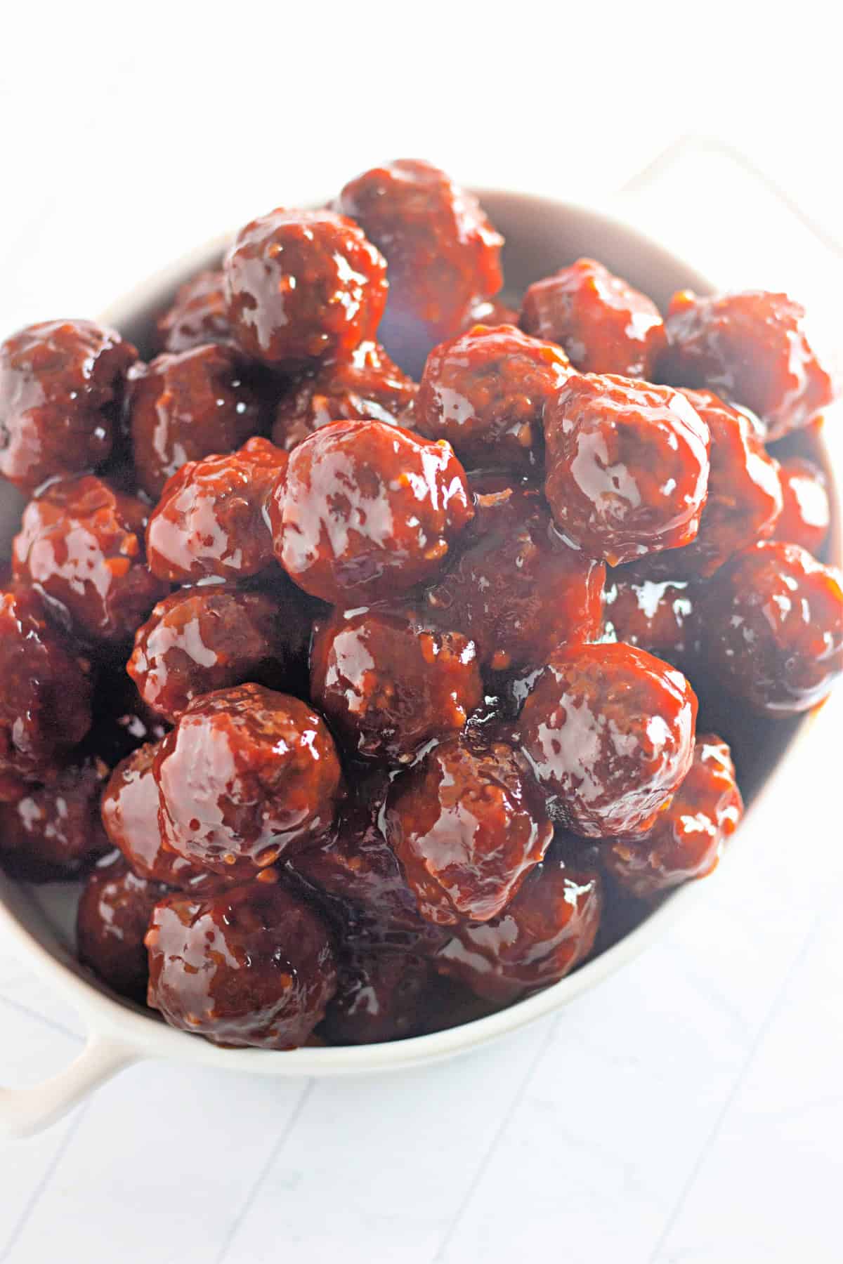 Hot Honey Glazed meatballs in white dish 