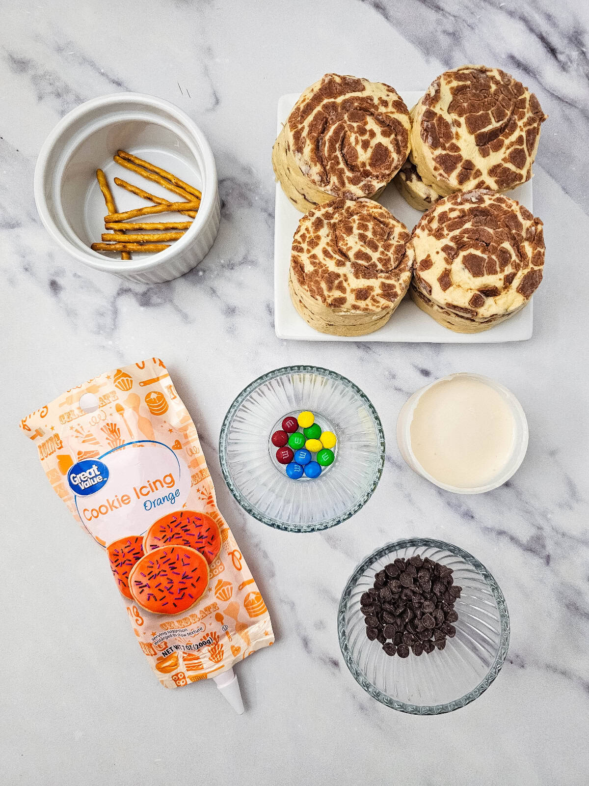 Ingredients needed for snowman cinnamon rolls