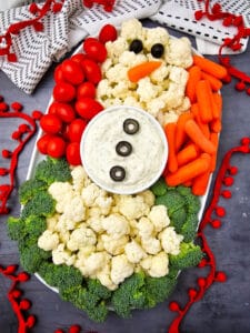 Snowman Veggie Platter with red ribbon