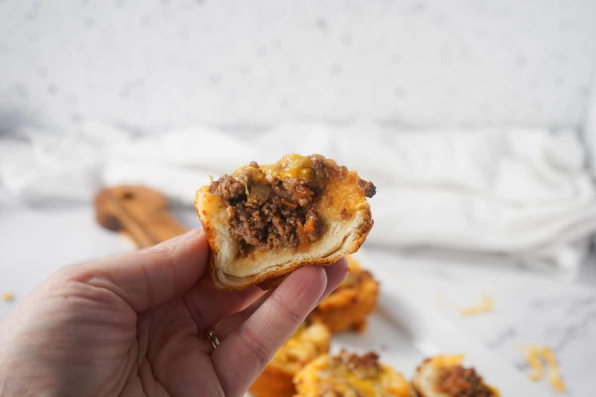 BBQ Burger Biscuits cup in hand