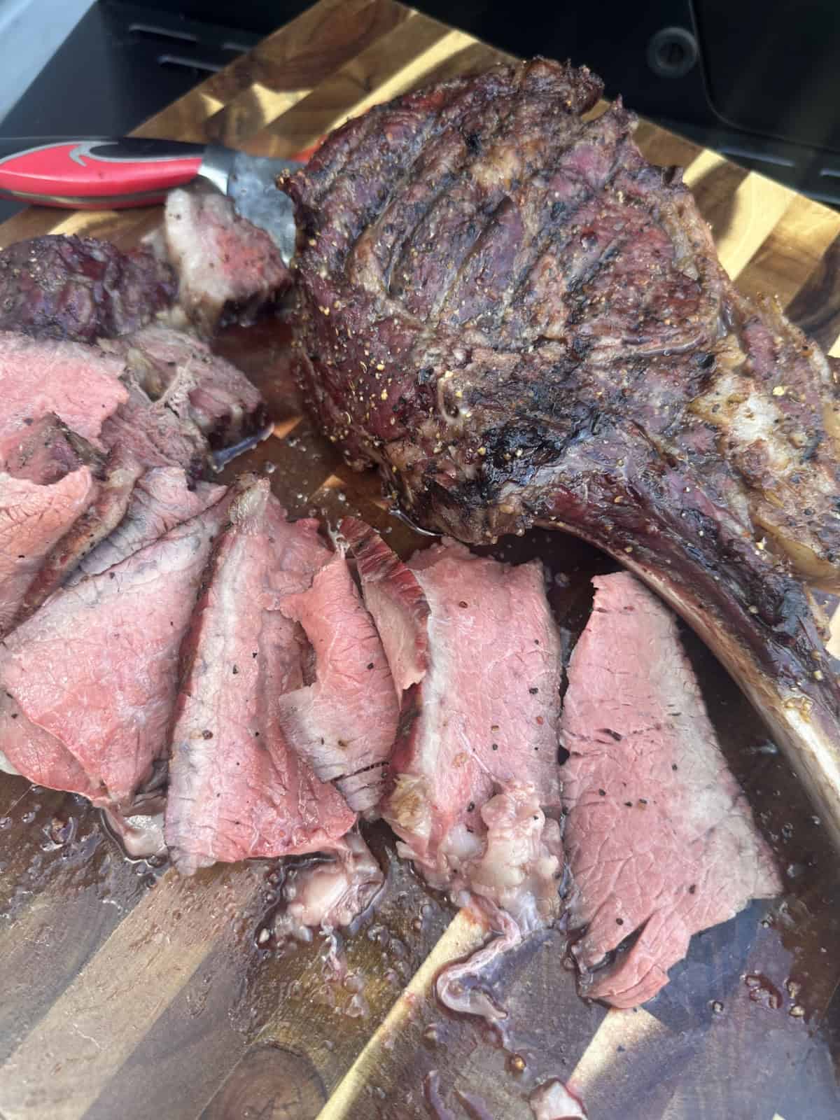 Tomahawk steak sliced