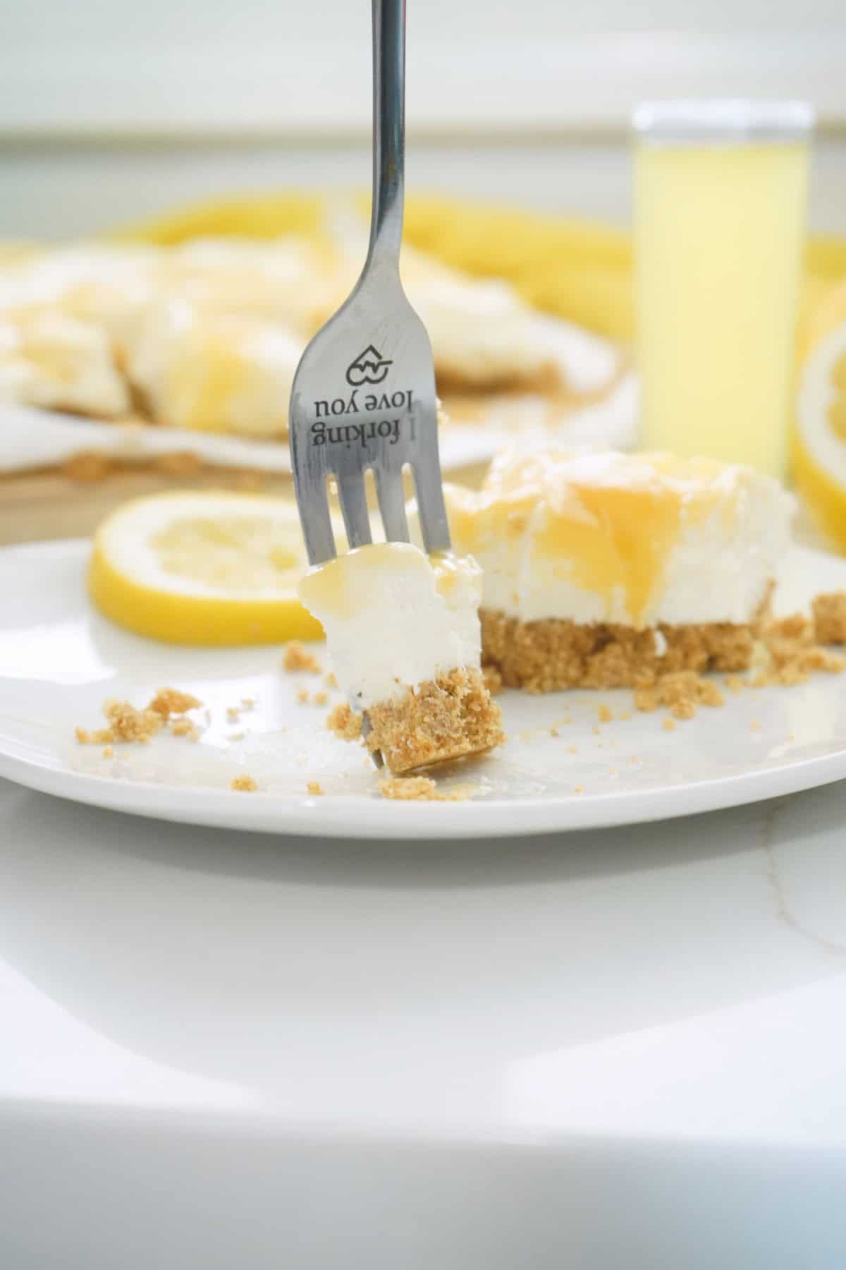 Limoncello Cheesecake with bite on fork 