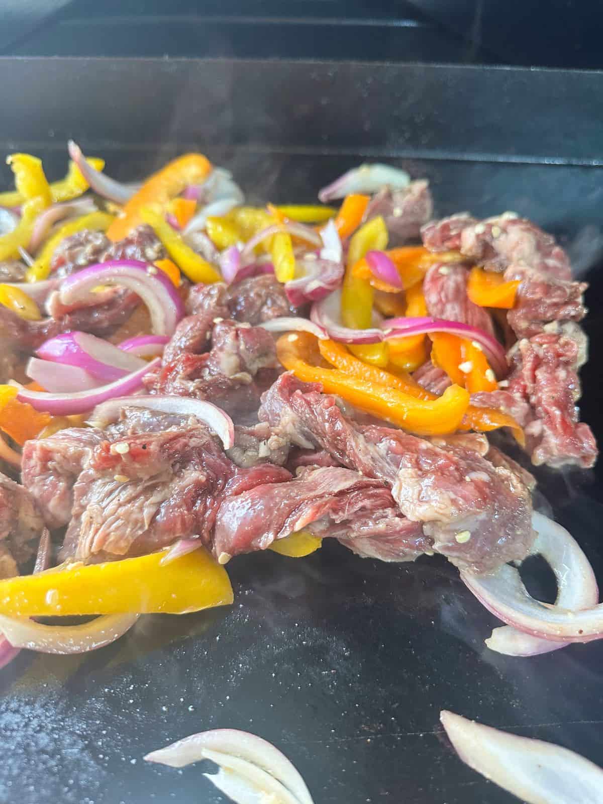 skirt steak being cooked