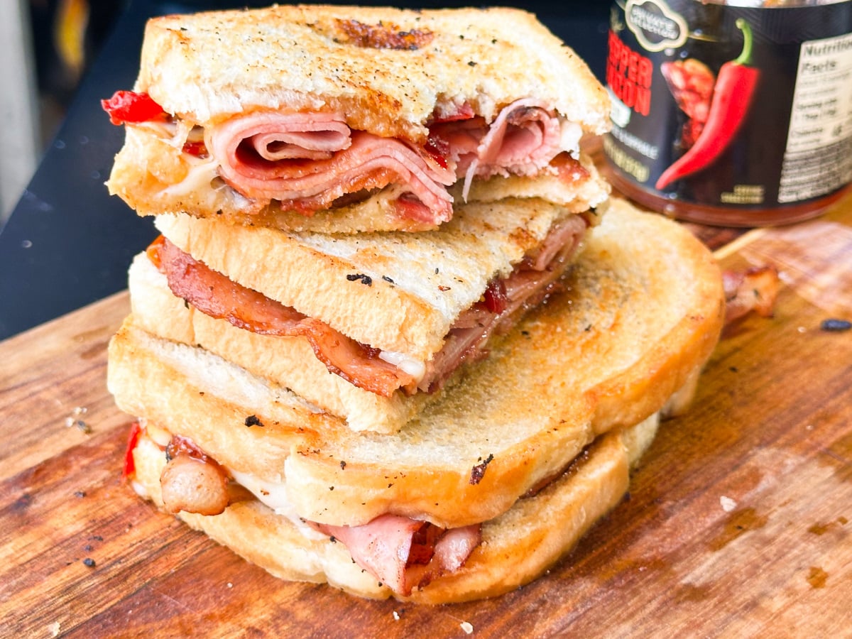 Bacon Jam sandwiches on a cutting board. 