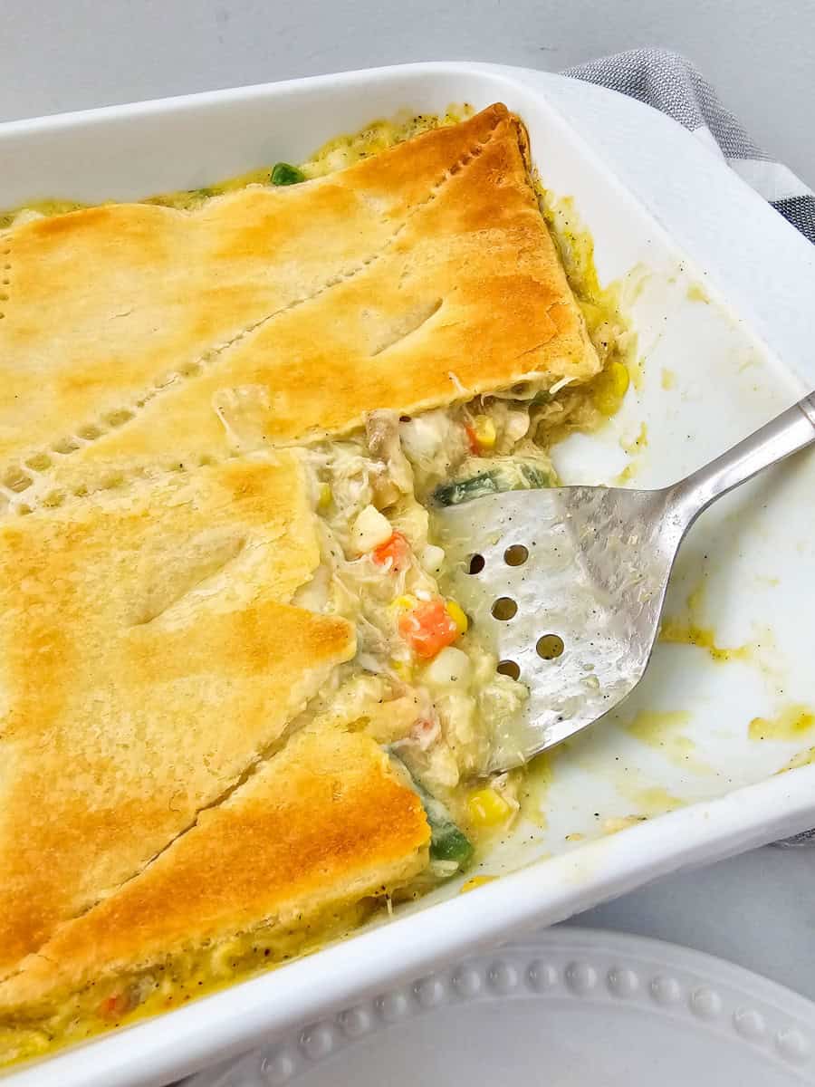 Spatula in chicken pot pie casserole.