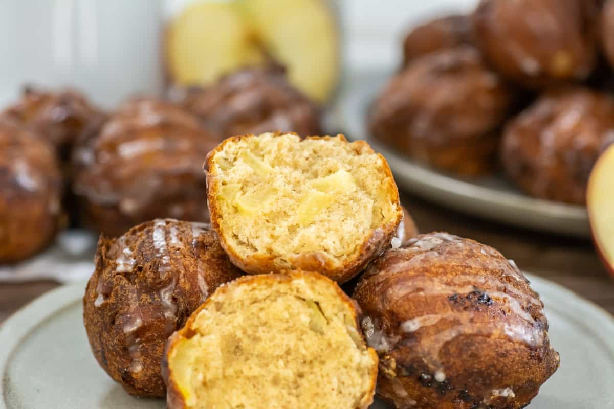 Apple fritters with bite missing.