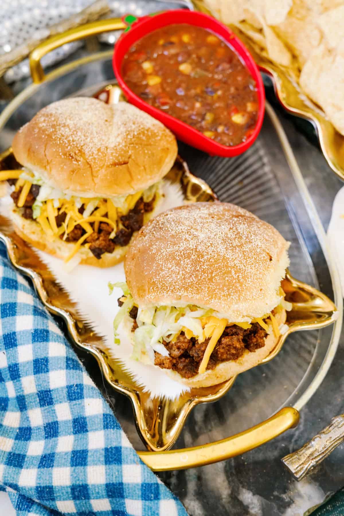 Two taco sloppy joes on platter.
